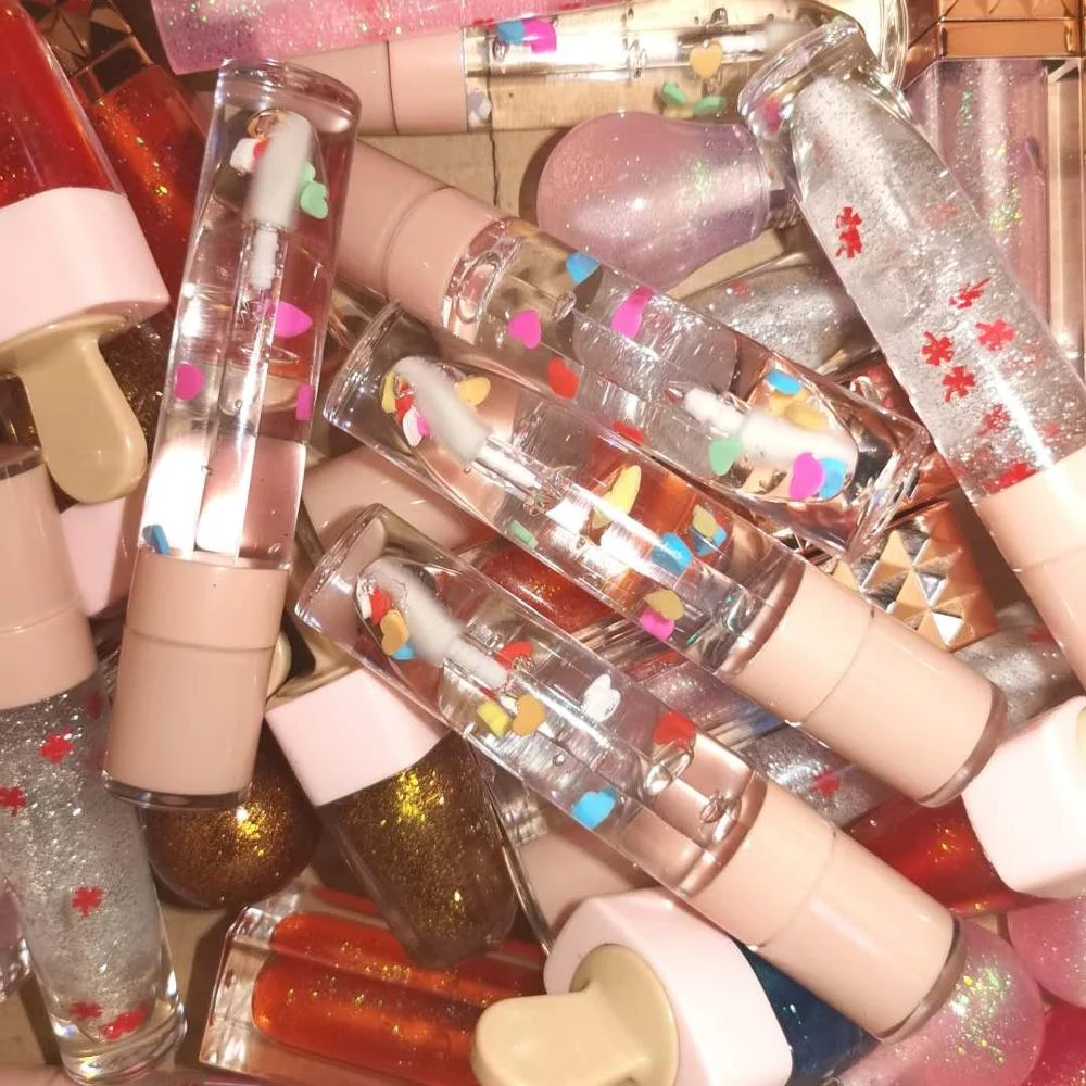 

Wholesale Custom Lip Gloss Private Label Vendor Natural Lip Gloss with Unique Lip Gloss Container and Butterfly Stuff