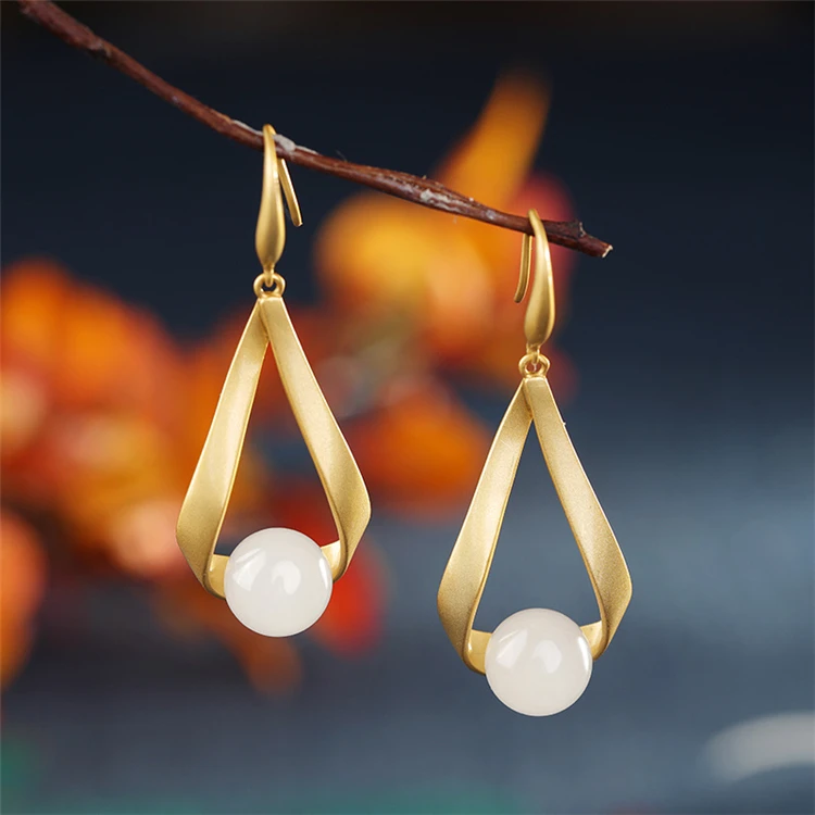 

Aimgal S925 sterling silver gold-plated Hetian white jade earrings fashion simple light luxury earrings for women AP2