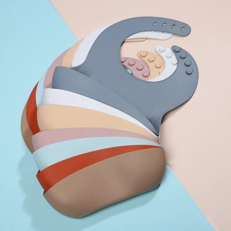 
BPA Free Waterproof Silicone Baby Bib With with Food Catcher Baby Silicone Bibs Wholesale 