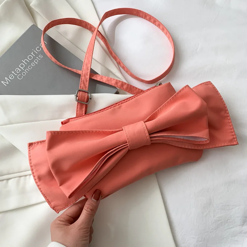 

2021 Women Hand Bags Fashion Simple Solid Color Bowknot Retro Messenger Small Fresh Texture Personality Shoulder Bag, Picture color