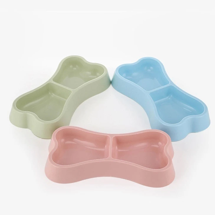 

Factory Direct Sales New Pet Dog Bowl Food Bowl Cute Candy Color Dispenser Plastic Bone-Shaped Pet Twin Bowl, Green,blue,pink