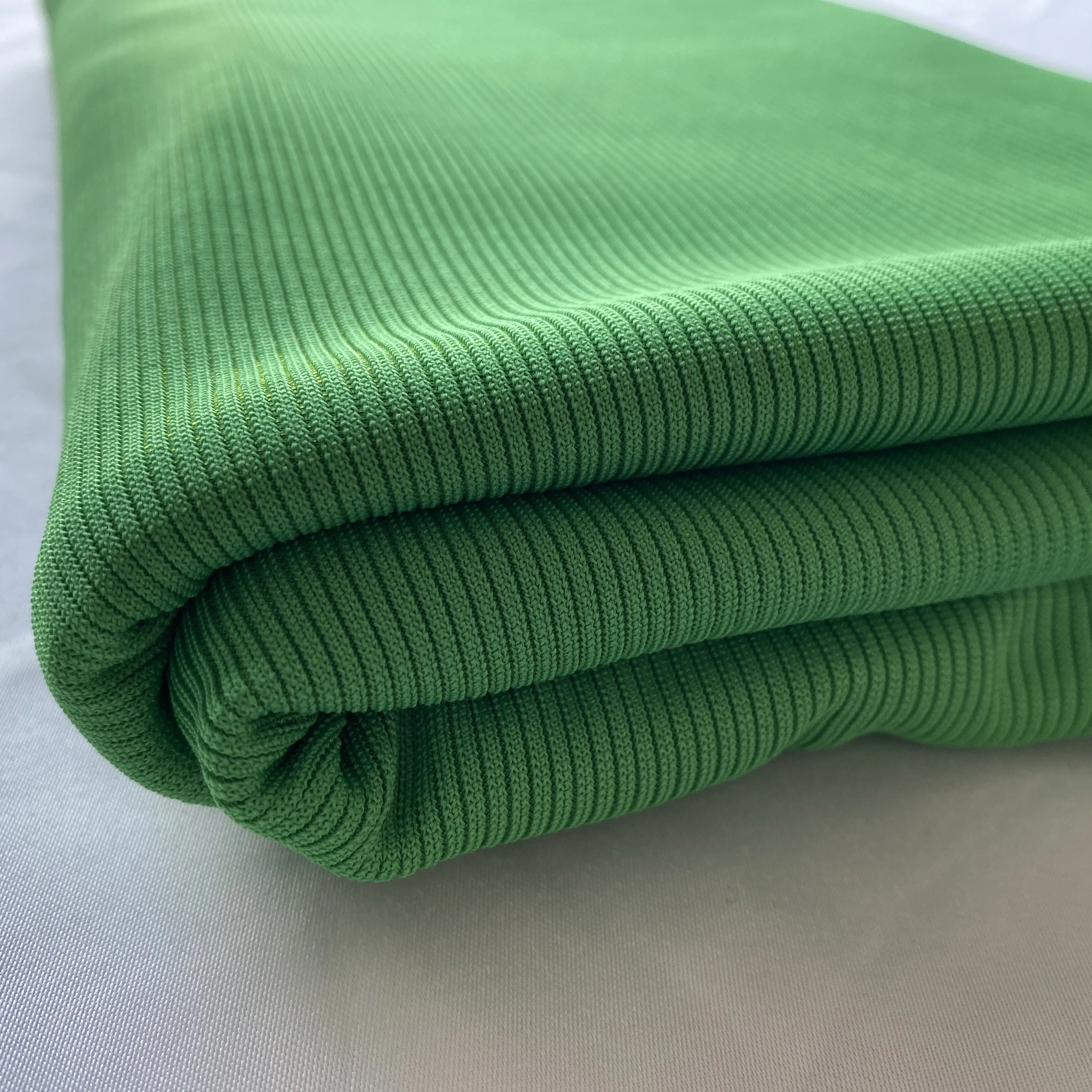 亮绿色透气平纹染色管状罗纹循环涤纶棉联锁针织面料