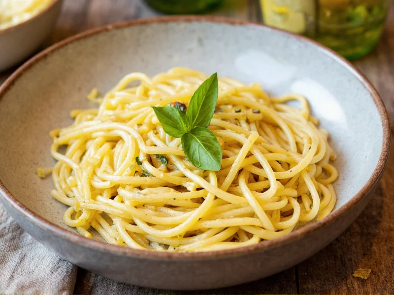 Homemade pasta served with fresh basil and olive oil