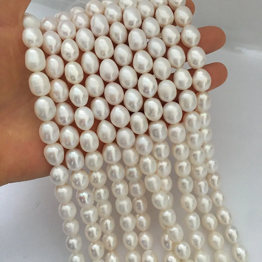 

100% FRESHWATER PEARL ,10-11 mm AAA grade high quality rice shape pearl in strand loose wholesale freshwater pearl