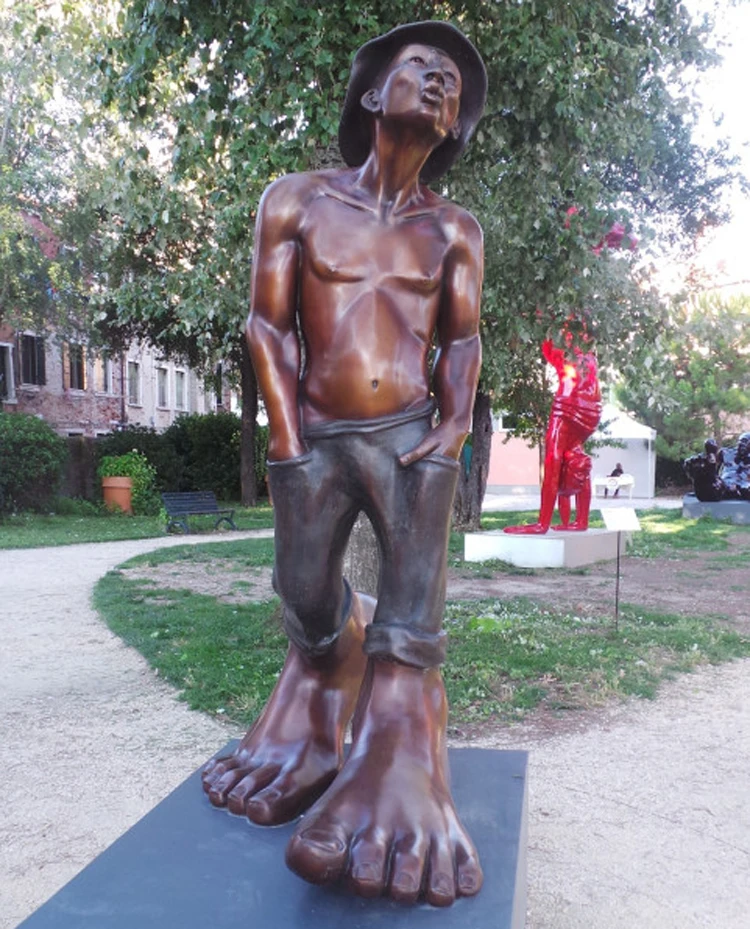bronze blowing whistle statue