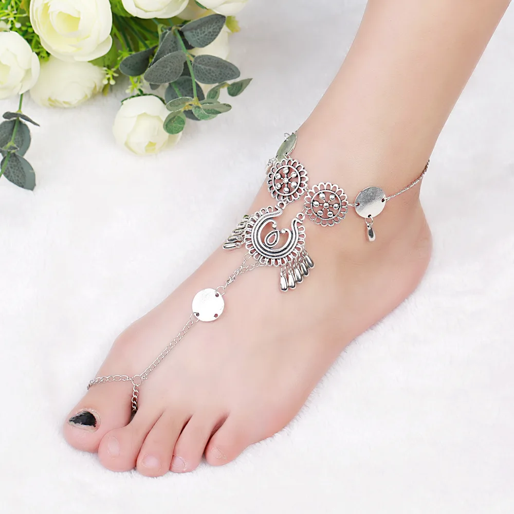 

Hot selling fashion foreign trade jewelry flower hollowed out carved water droplet shaped tassel beach anklet