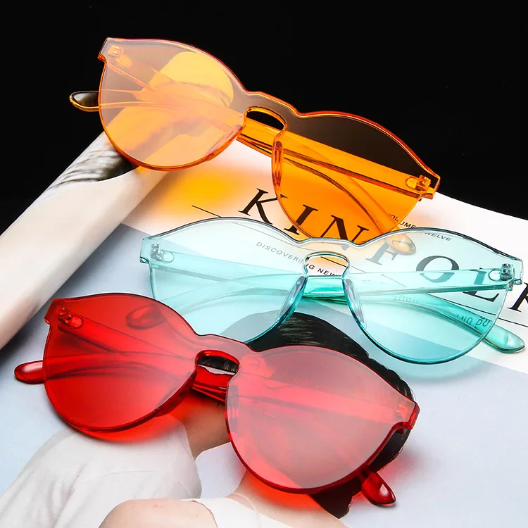 

2022 Trendy One Piece Round Rimless Candy Transparent Color Lens Eyewear Fashion Sun Glasses Shades Sunglasses For Women