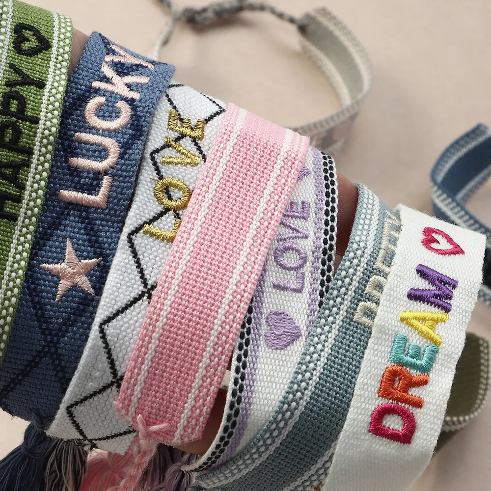 

Custom Logo Adjustable Friendship Bracelet Boho Handmade Letter Heart Embroidery Fabric Woven Rope Tassel Wristband Bracelet