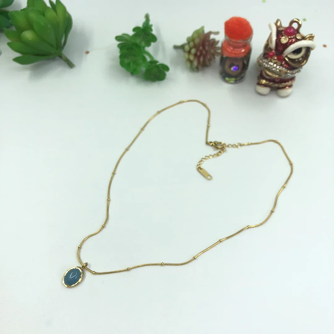 

Wholesale Women's Stainless Steel Jewelry 18K Gold Plated Oval Sapphire Charm Pendant Necklace Clavicle Chain