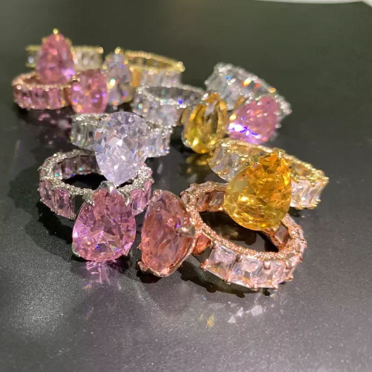 

UK hot sale trendy hip hop jewelry yellow pink white diamond ring plain gold rings jewelry women cubic zirconia rings
