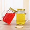 Fruit Tea Drink Straw And Lid Pattern Embossed Glass Mason Jars 500ML Glass Mason Jar With Lid Handle