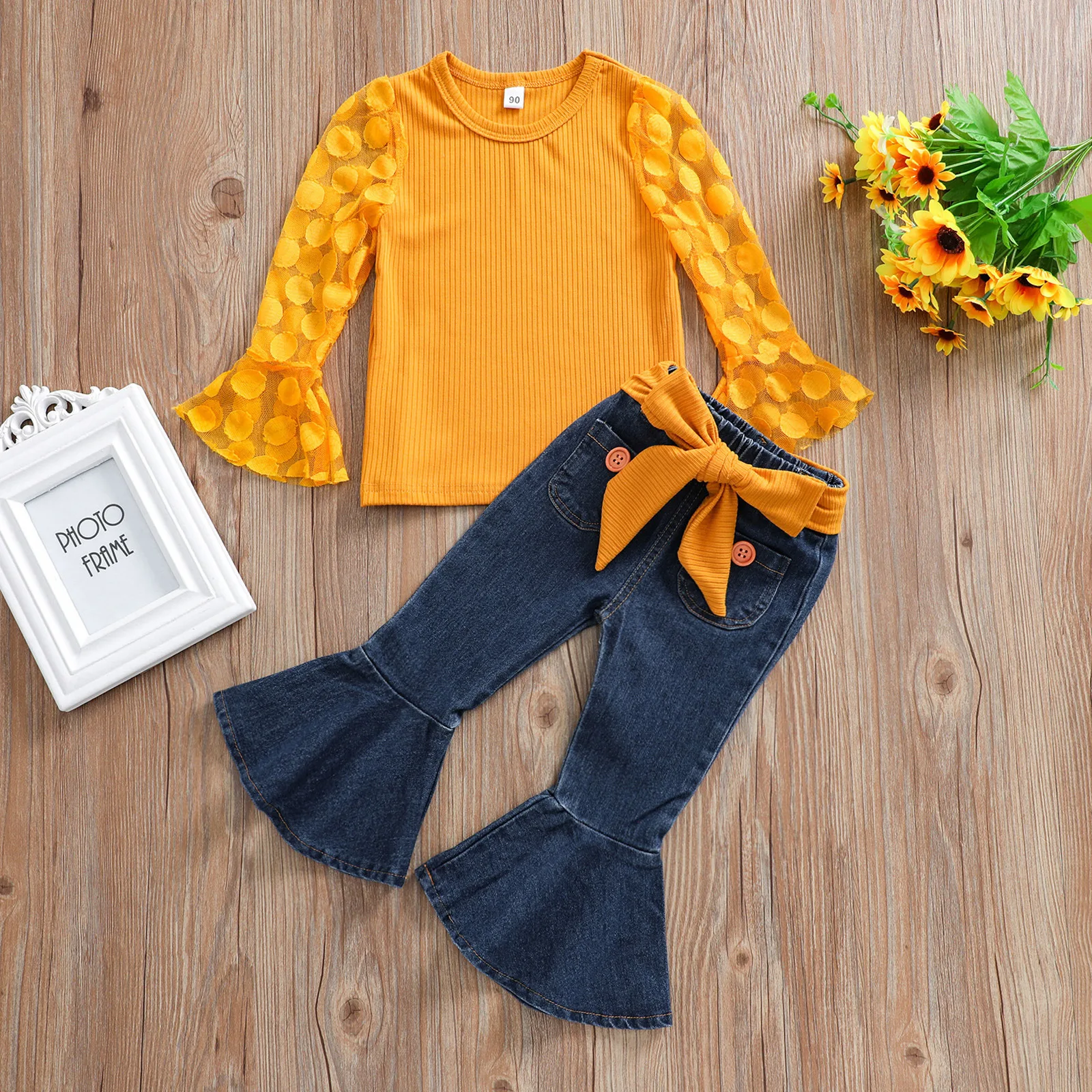 

Wholesale girls clothes outfits Yellow girls tops+denim flared trousers Girls clothing set