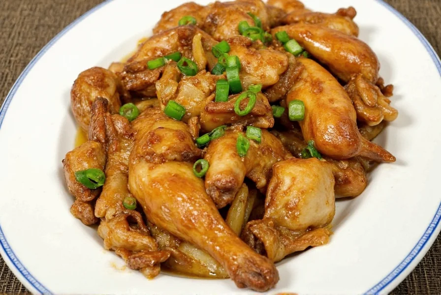 Fresh ginger root chicken recipe served over steamed rice with garnish