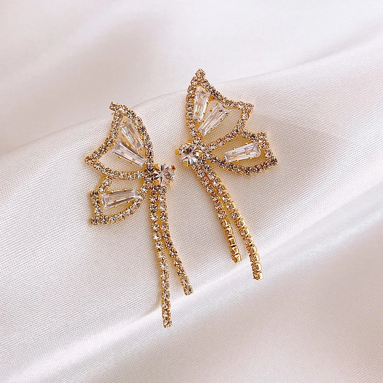 

2021 Korean 925 Silver Needle Hypoallergenic Shiny Rhinestone Butterfly Tassel Drop Earrings for women, As photos