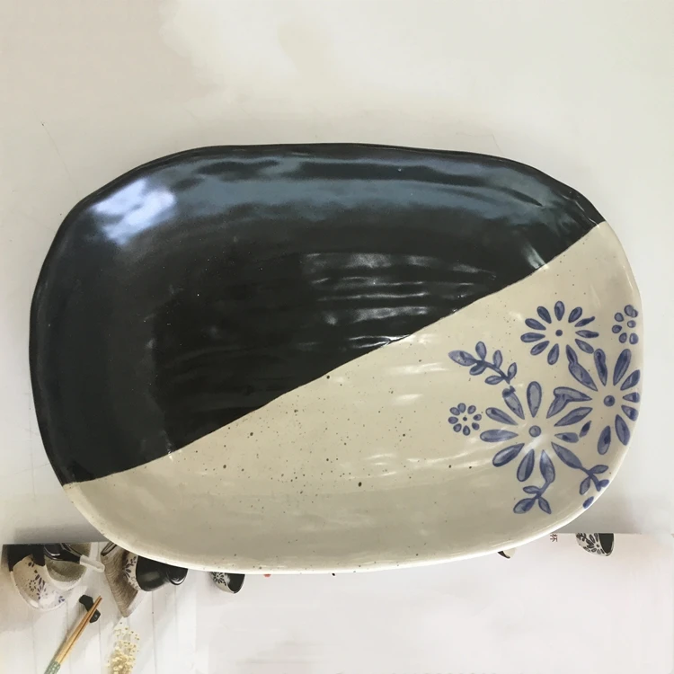 china wholesale restaurant fish dish antique oval large black and white ceramic plates in bulk.jpg