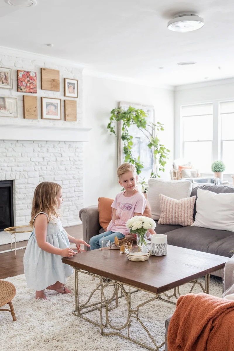 Playroom corner integrated into a living room with coordinated colors