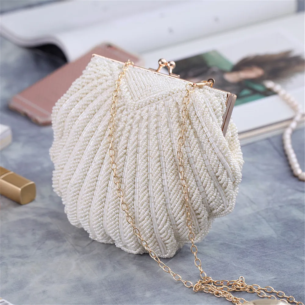 Round shape pearl and golden moli work purse – Chotteylal & sons