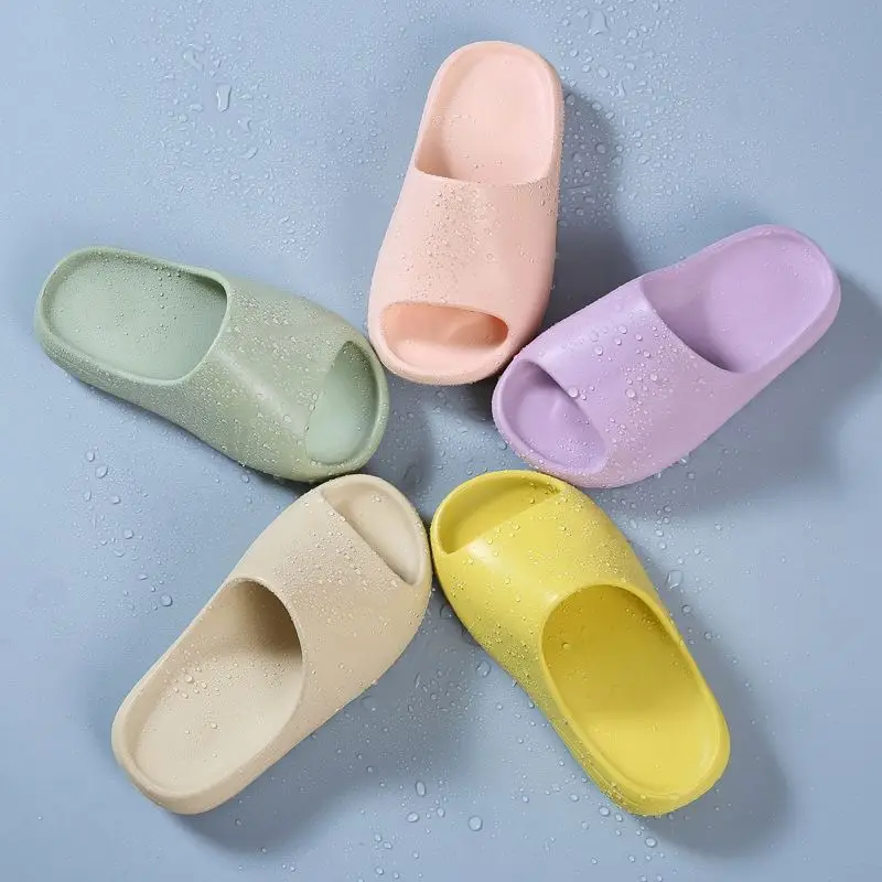 

Wholesale Kids Shower Sandal Yeezy Slippers colorful cute EVA kids clogs shoe Yeezy slides strap slides infant water shoes