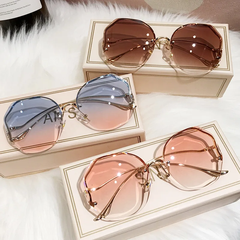 

2022 top rank fashion rimless rhinestone sunglasses high quality brand gradient shades women bling sunglasses newest 2021