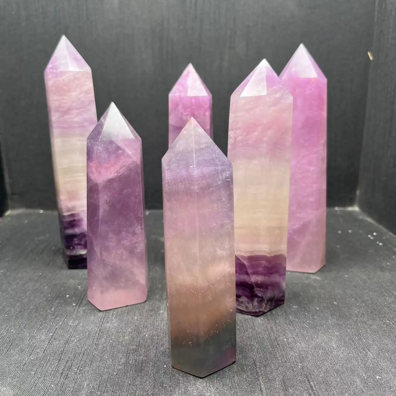 

Wholesale Natural Gemstone Healing Quartz Crystal Wand Tower Purple Fluorite Point For Decoration