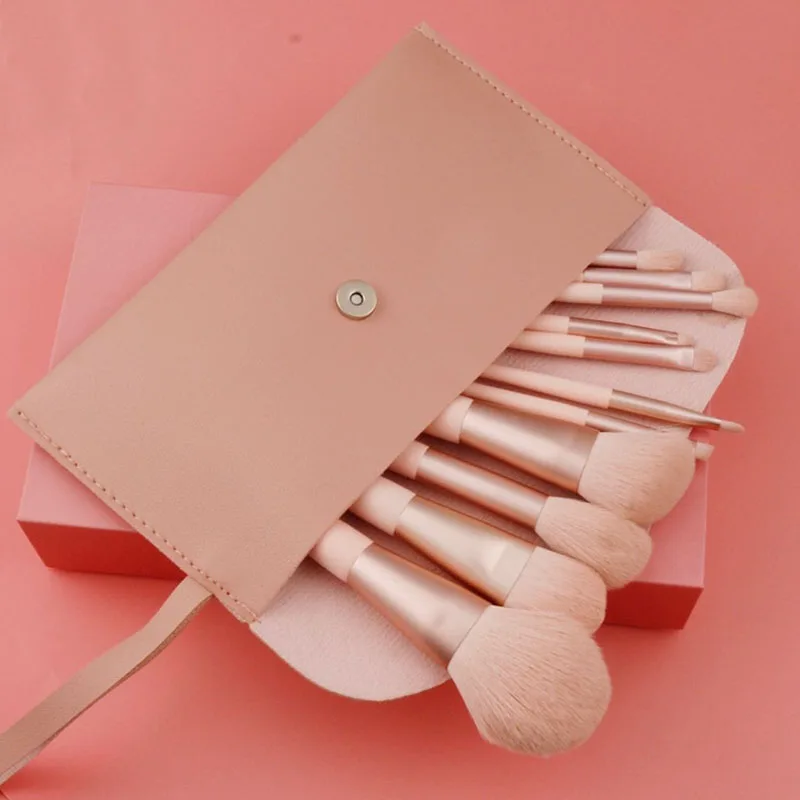 

2021 new wholesale 11pcs pink makeup brush set wood handle synthetic hair custom logo make up brush set with PU bag