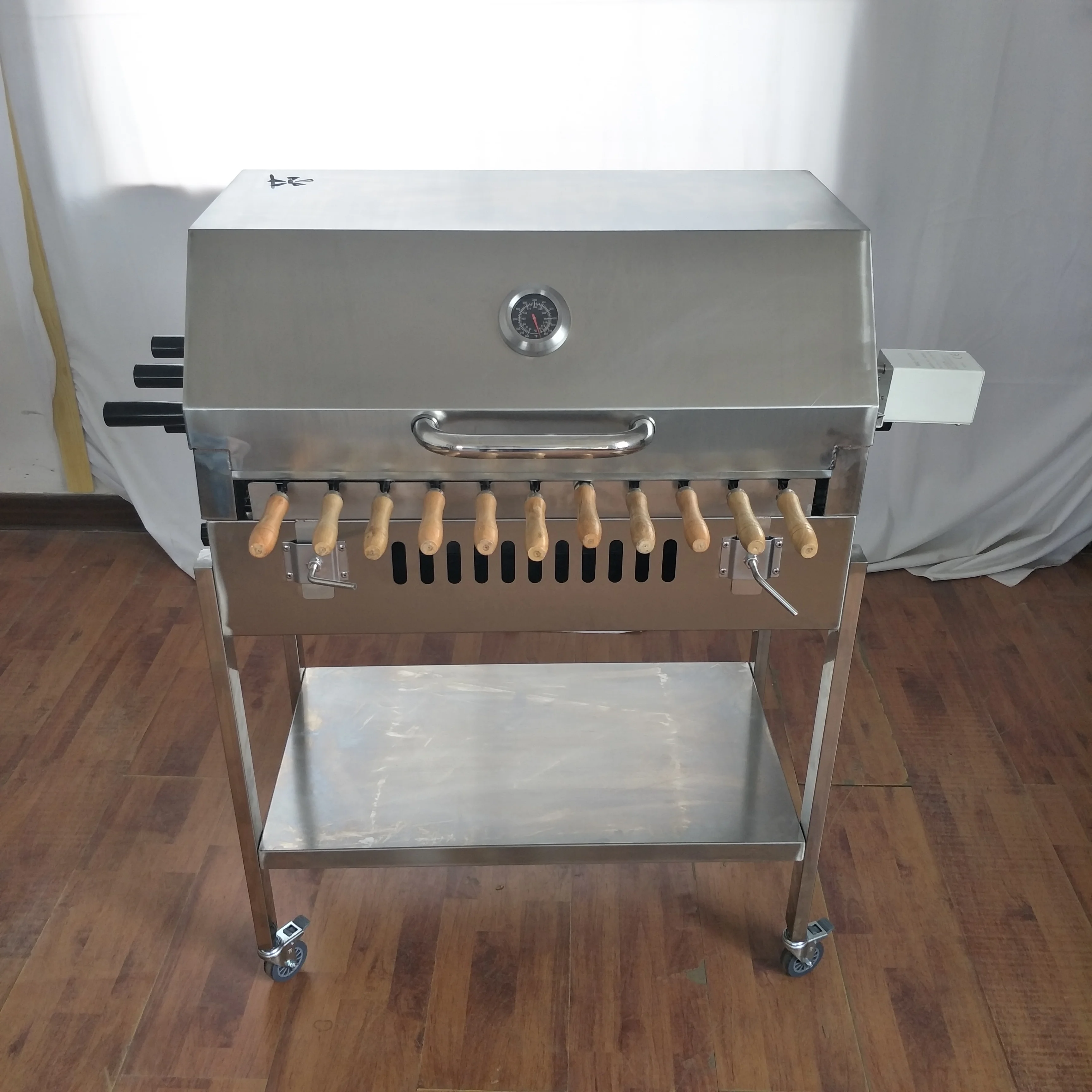 

Garden outdoor charcoal BBQ greek brazilian cyprus style rotating rotisserie grill with hood