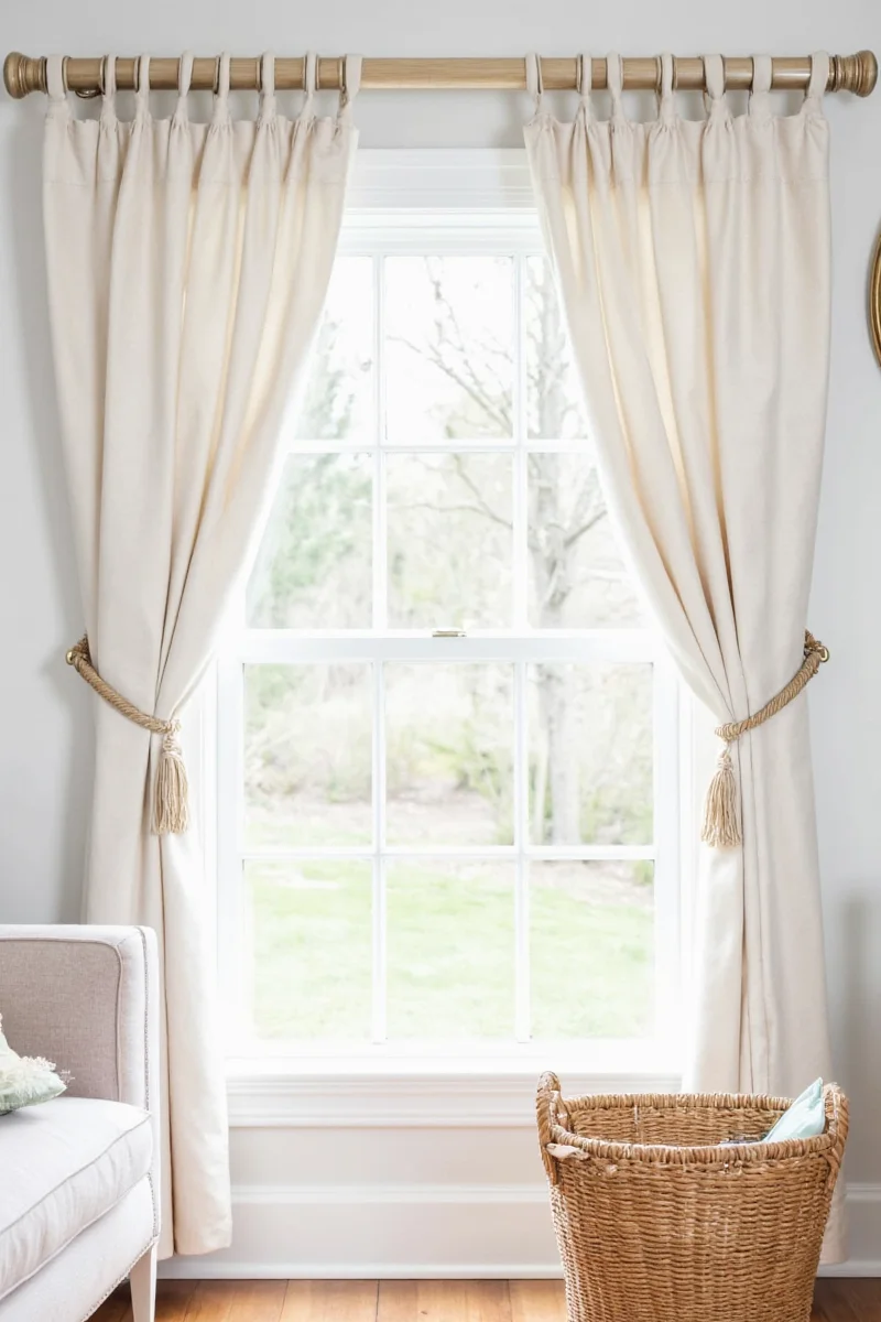 A family installing command hook curtain rods together