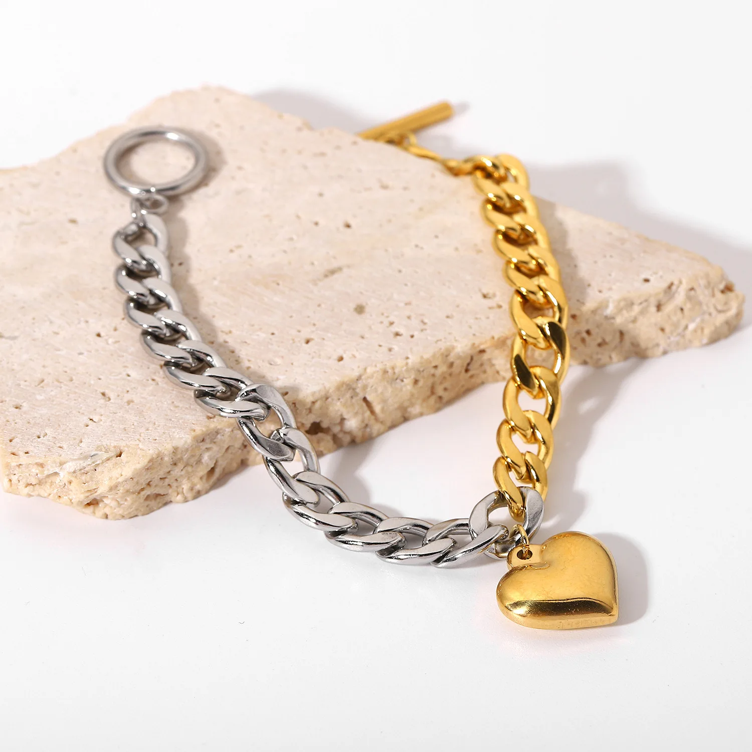 

Aimgal Fine Jewelry Stainless steel 18k gold plated Steel + gold stitching Cuban chain heart bracelet