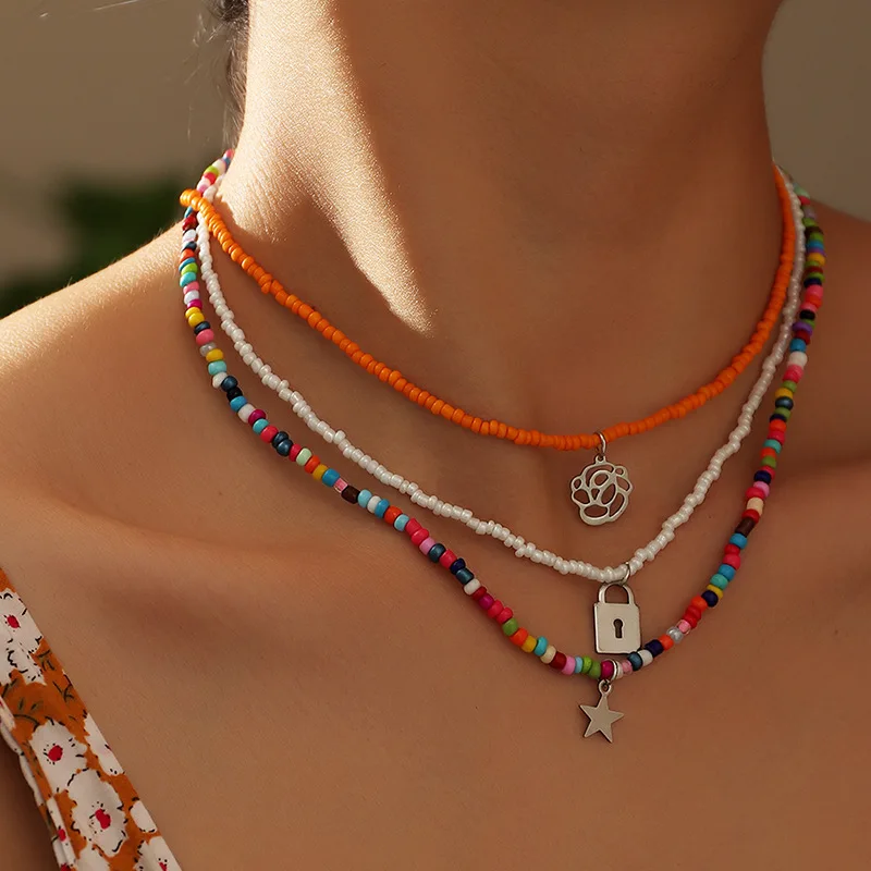 

Bohemian Multi Layers Colored Hollow Floral Lock Star Beaded Clavicle Chain Necklace, Pictures