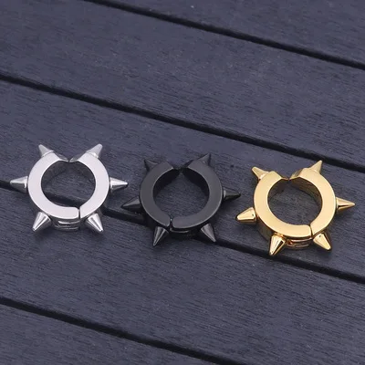 

Korean fashion punk rivet sharp cone titanium steel earrings male stainless steel perforated personalized ring ear clip