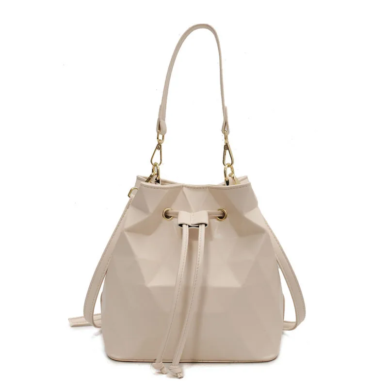 

Geometric Three-dimensional Triangle Pattern Simple Fashion Large-capacity Portable Pumping Bucket Bag Shoulder Messenger Bag