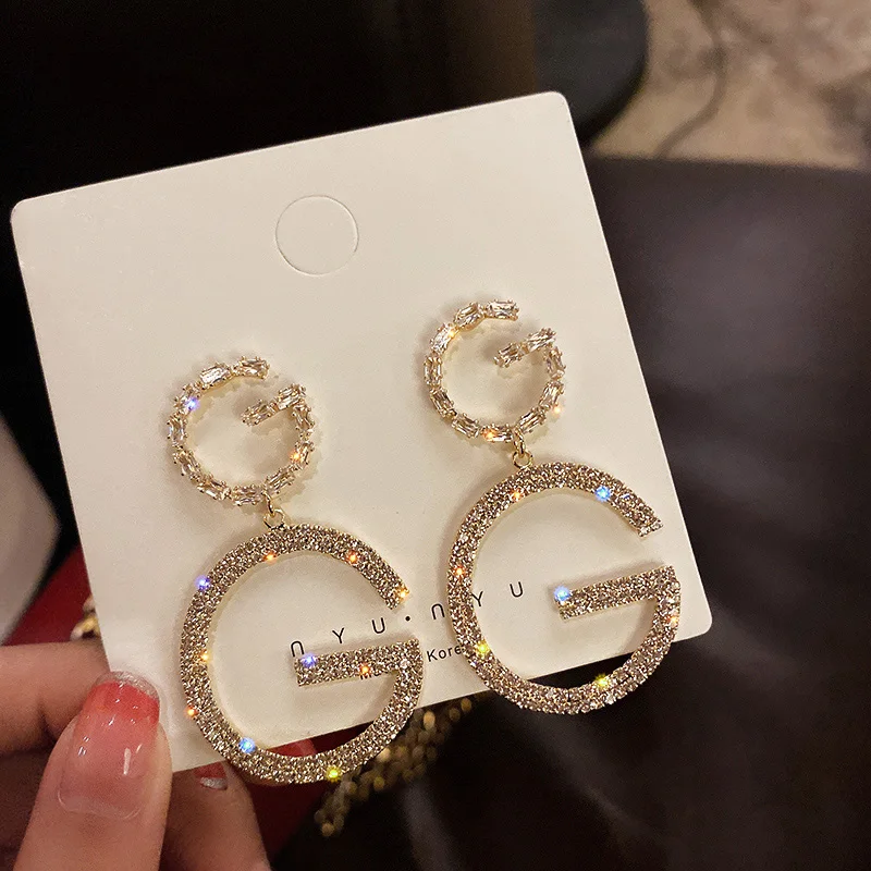 

Kaimei Luxury Brand Long Chain Letter G Hanging Earrings For Women Crystal Big Dangle Crystal Rhinestone GG Dangle Earring, Many colors fyi