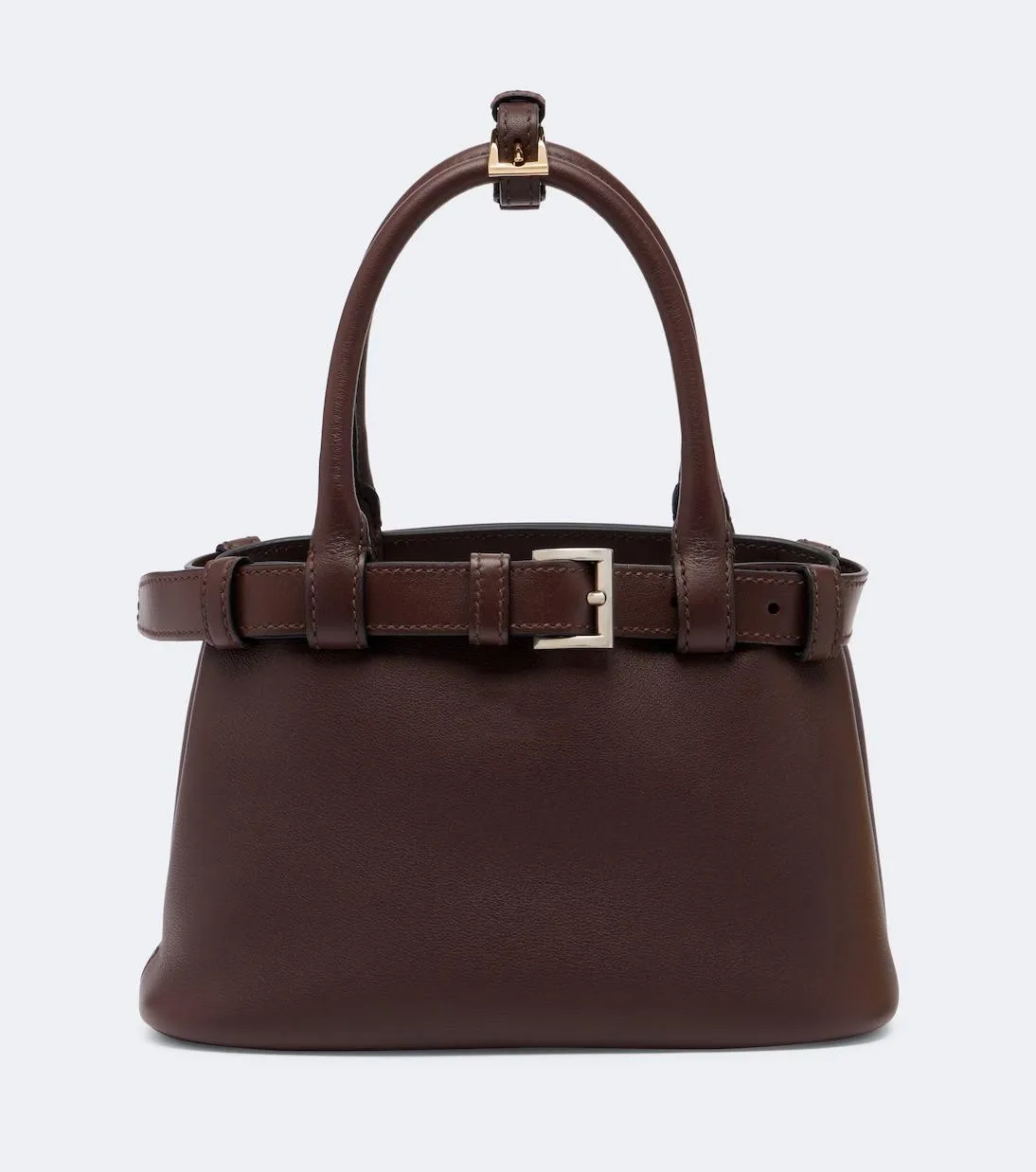 Dark brown leather tote bag with belt-style strap and silver single-prong pin buckle