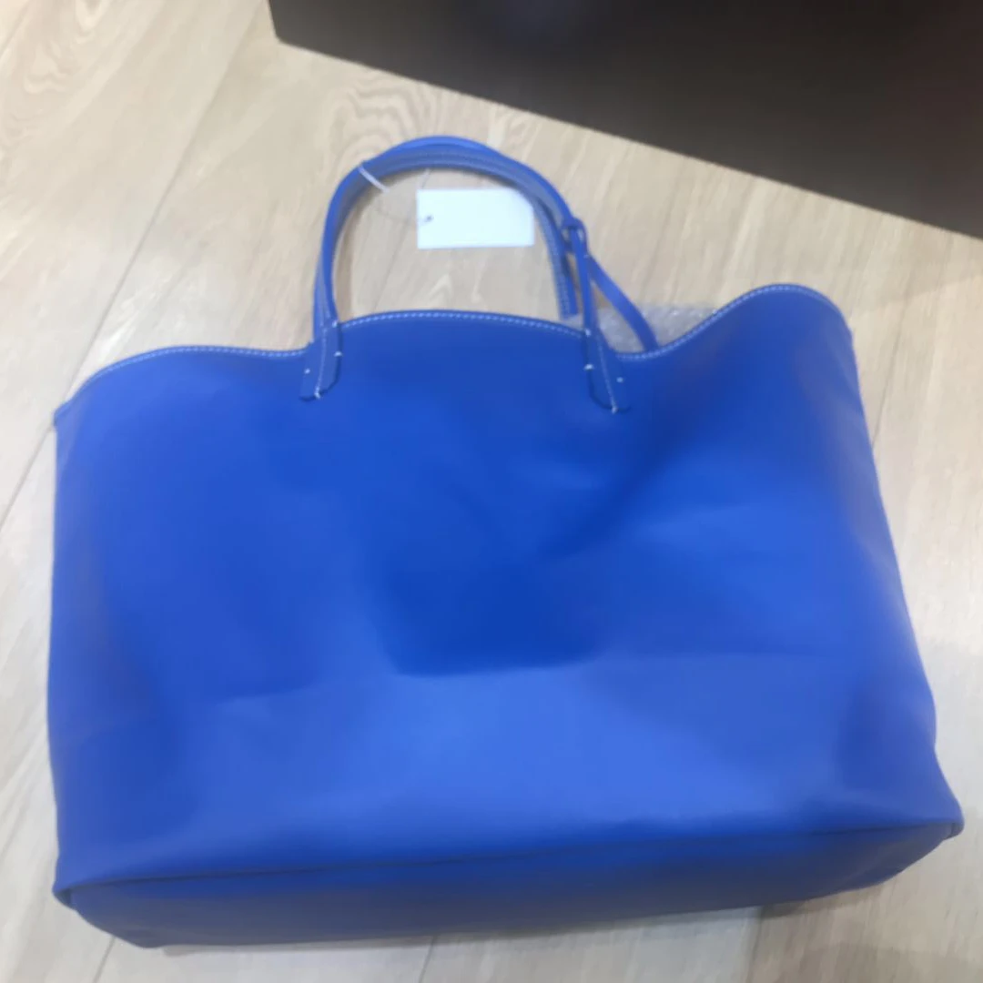 Hot sell fashion new large capacity high quality senior designer handbag shopping bag leather Pajama bag large capacity