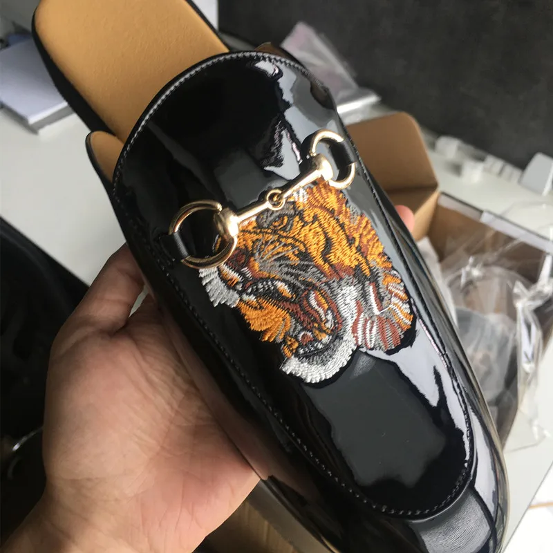 

LAZADA slip on black shiny PU leather embroidery dress casual men half slippers shoes loafers