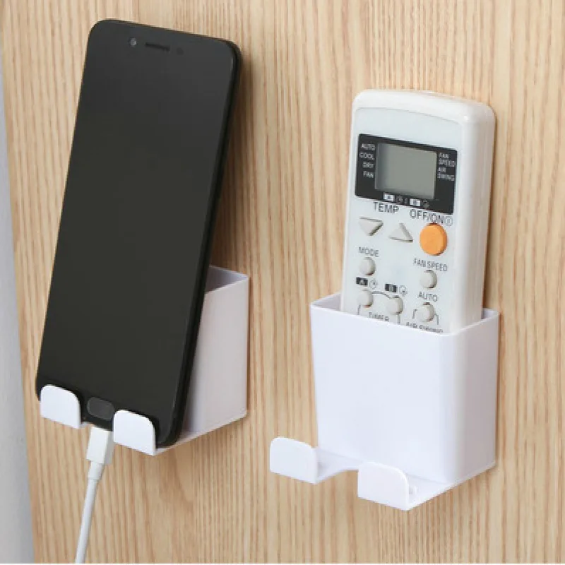 

1pcs Wall Mounted Organizer Remote control mobile phone storage bracket Plug Holder Stand Container