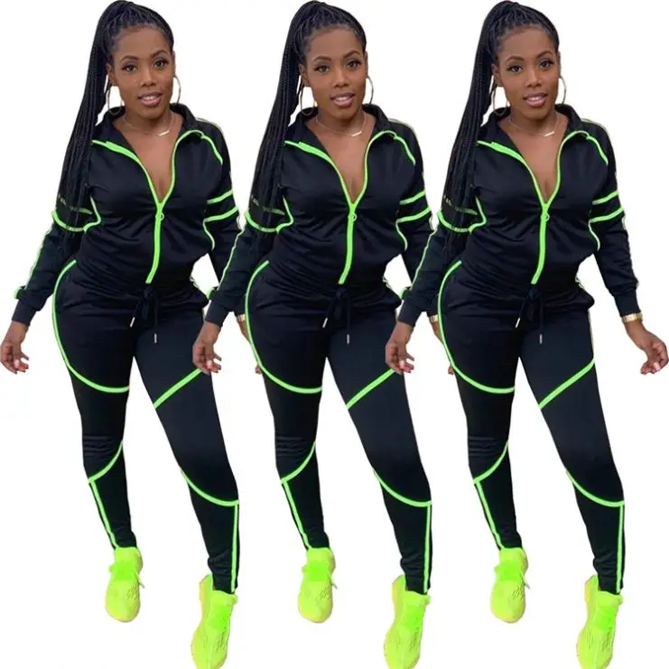 11AF142 stylish fluorescent side stripe solid zip sports Pant Clothing Women Two Piece Set 2020