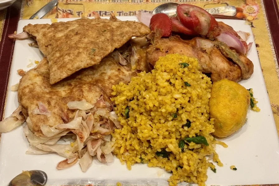 Traditional South Indian thali platter at Turmeric restaurant in Sunnyvale featuring multiple small dishes including sambar, rasam, and rice