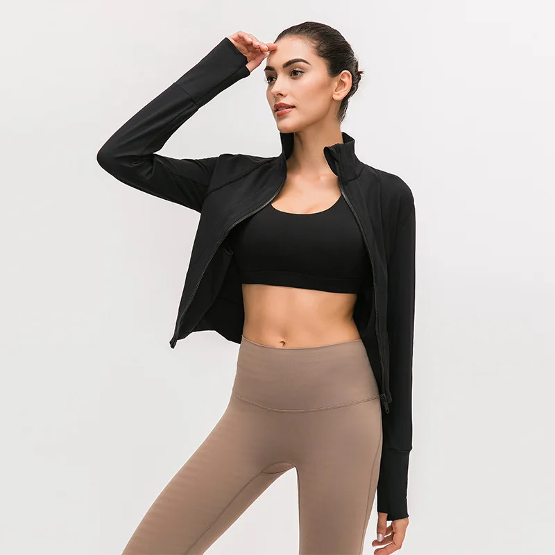

2021 autumn and winter New Stand Collar slim yoga suit nude fitness top zipper casual sports coat women