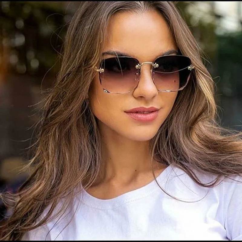 

2023 Rimless cut lens Light sun glasses women colorful casual UV protection shades portable large frame square sunglasses