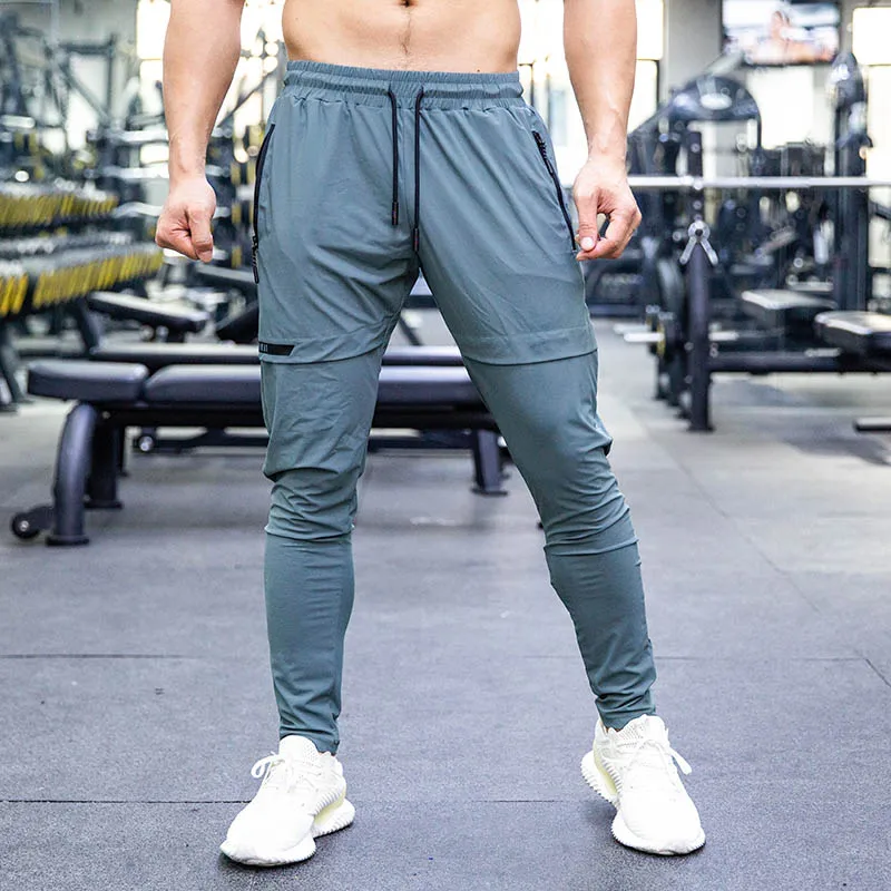 

high elastic Training Pant new arrival men's casual Four Way Stretch pants zip pockets OEM custom logo gym trousers for men