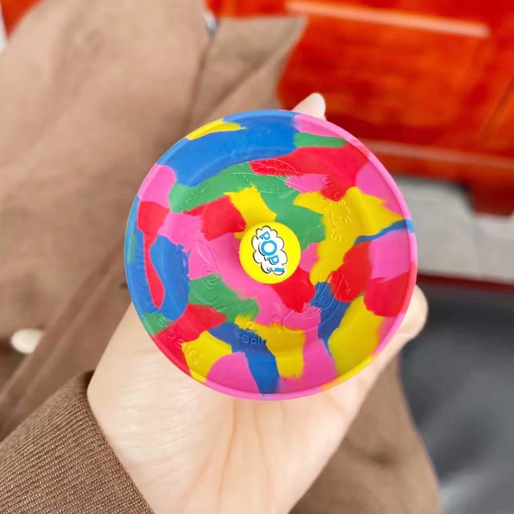 

Hop pops toys rubber colourful camouflage bounce bowl spinning top jumping half bouncing ball for kids