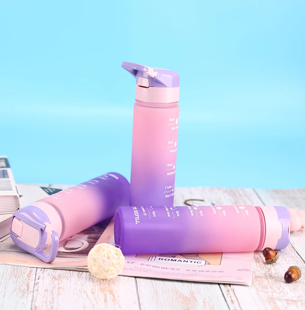 

custom logo BPA free purple push button 700ml frosted soft touch motivational water bottle with time maker for sports
