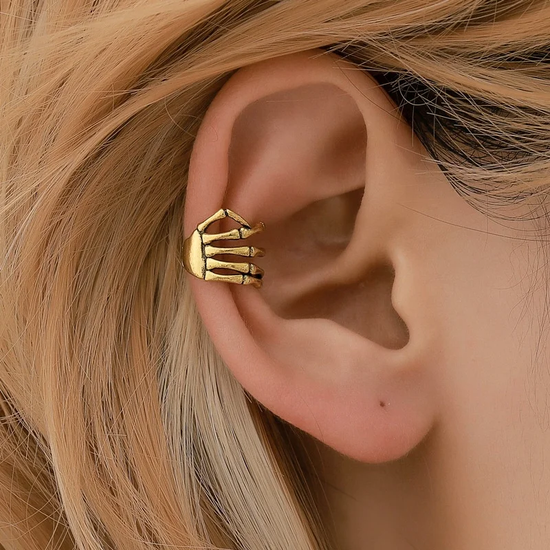 

CLARMER European and American fashion personality punk style skull hand spine ear bone clip earrings for woman and girls, Picture shows