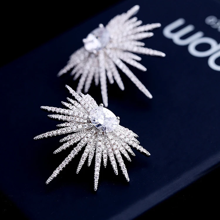 

global sales are widely used professional design simple sun flower star silver needle earrings yujie fan xingmang earrings