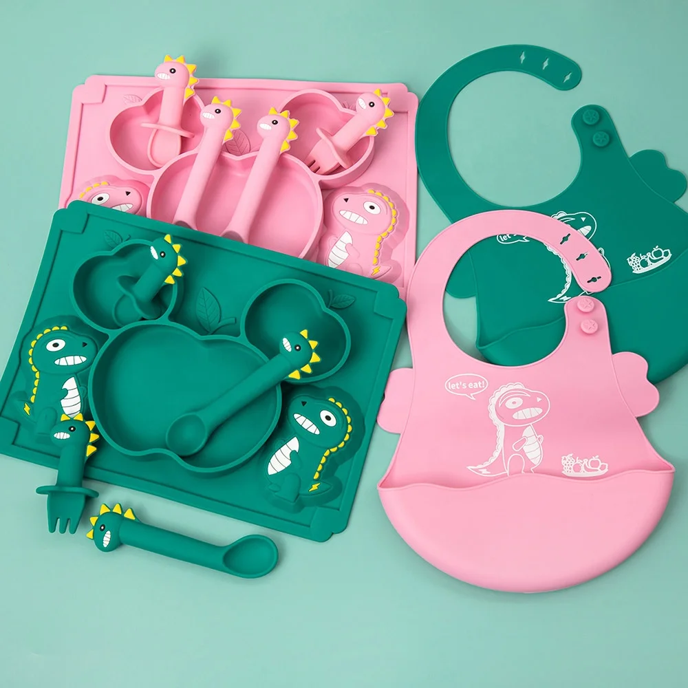 

Food Grade Silicone Baby Tableware BPA Free Silicone Dinosaur Pattern Suction Dinner Plate Bib Spoon And Fork Set, Pink & green