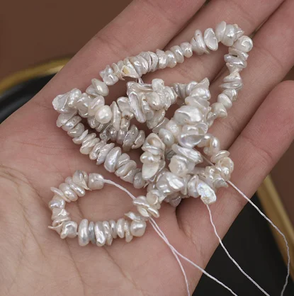 

Wholesale Stock 8-9mm Baroque Pearl Loose Bead Flat Round With Holes Natural Freshwater Pearl