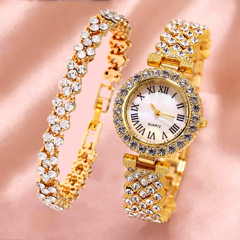 

Wholesale new fashion cheapest lady watch luxury hand watch silver and gold case bling stones strap