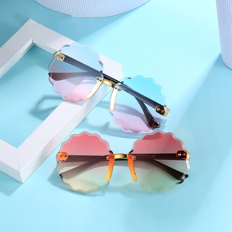

2021 New Arrivals Mommy And Me Sunglasses Toddler Wave Rimless Round Sunglasses