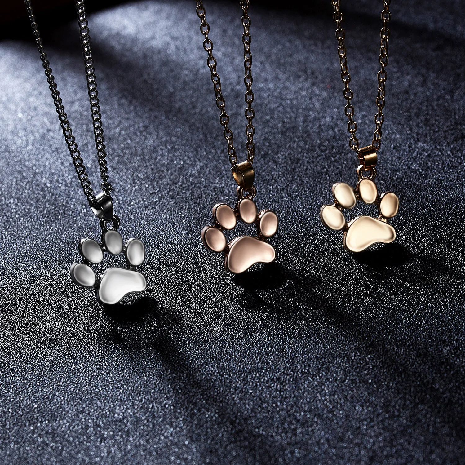 

Hot Sale Jewelry Fashion Cute Animal Cat Dog Claw Foot Footprint Necklace Hollow Dog Paw Print Necklace Women